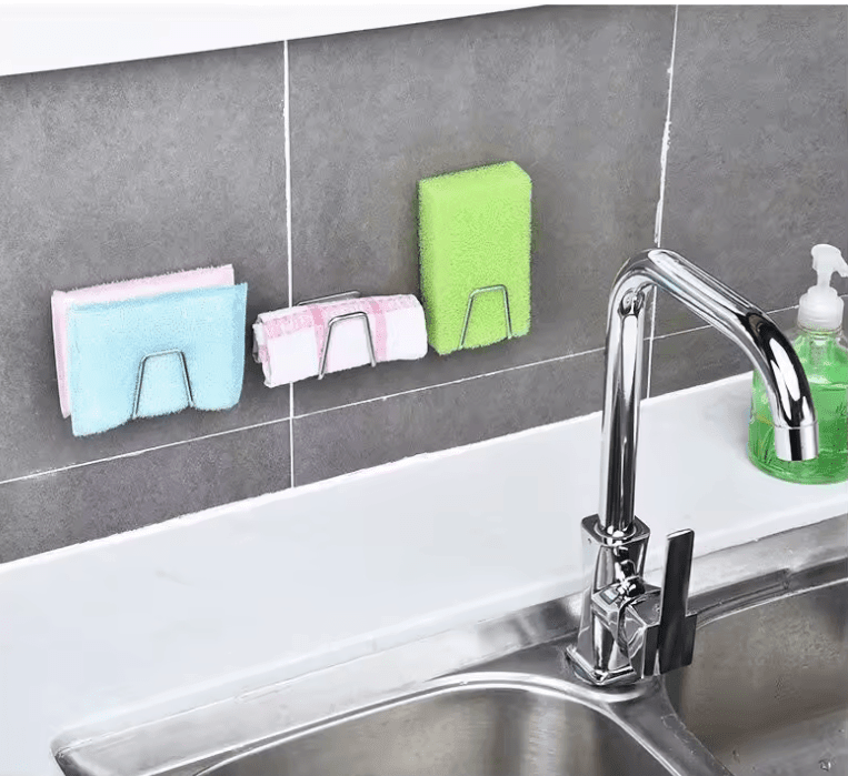 1PC Stainless Steel Sink Sponge Holder – Self-Adhesive Drying Rack & Kitchen Organizer 1PC Stainless Steel Sink Sponge Holder – Self-Adhesive Drying Rack & Kitchen Organizer