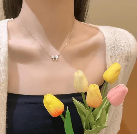 Light & Luxurious Opal Bow Necklace – Fashionable Titanium Steel Chain for Women