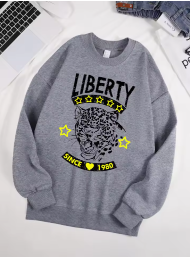 Leopard Print “Free and Unrestrained” Unisex Fleece Sweatshirt