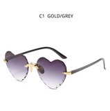 Fashion Heart-Shaped Women’s Sunglasses – Vintage Pink Rimless Shades