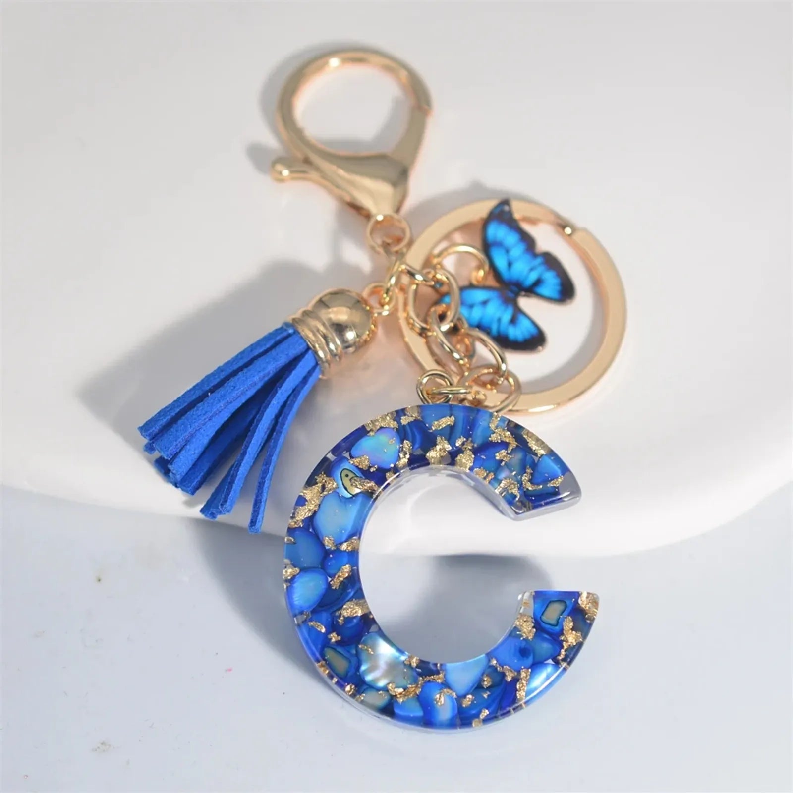 Blue Glazed Stone A-Z Letter Keychain with Butterfly Pendant